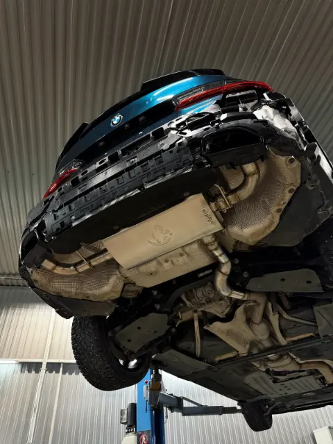 Глушитель и разводка управляемого выхлопа BMW G20